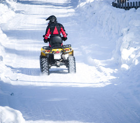 Fototapeta na wymiar ATV in snow
