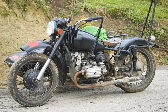 Old motorcycle with side car