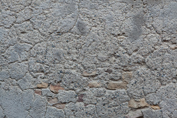 Old wall with cracked plaster. Background texture