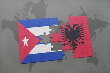 puzzle with the national flag of cuba and albania on a world map background.