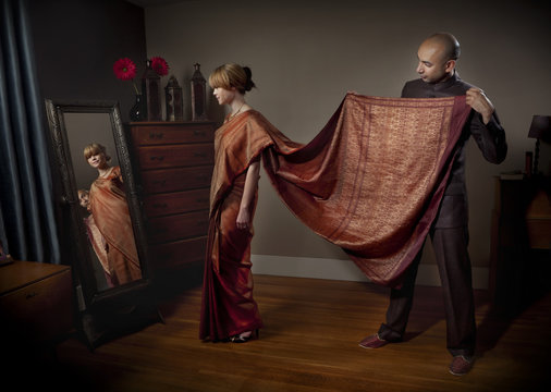 Woman dressing in traditional Indian clothing