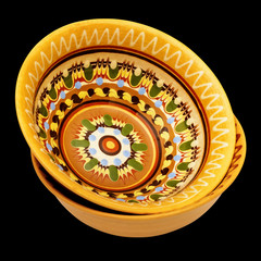 Traditional colored pottery. Painted ceramic crockery.