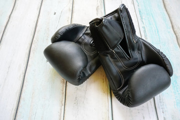 Boxing gloves on wooden background
