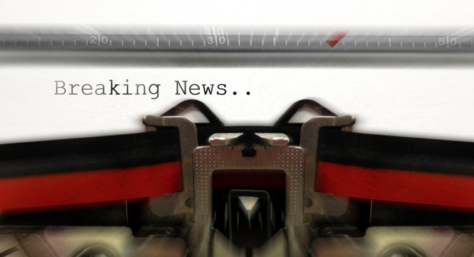 Old typewriter with breaking news