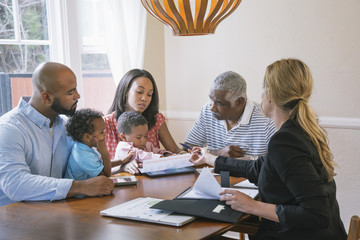Financial advisor talking to clients