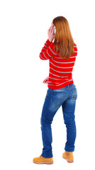 back view of a woman talking on the phone.  backside view of person.  Rear view people collection. Isolated over white background. The blonde in a red striped jacket is talking on the white smartphone