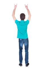 back view of dancing young man. Rear view people collection.  backside view of person.  Isolated over white background. Curly man in a turquoise jacket waving his hands to the music.