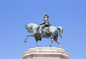 Monument of Victor Emmanuel II with blue sky background in front of Altar of Fatherland in Rome