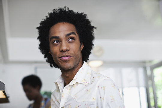 Mixed race man smiling