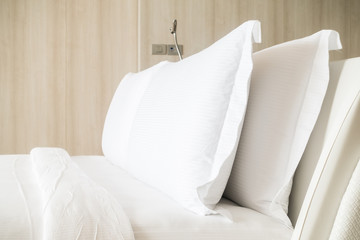 White pillow on bed
