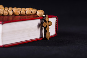 Bible and cross in religious concept