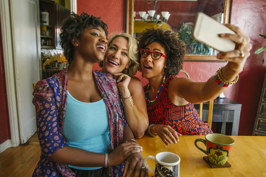 Smiling Women Taking Selfie