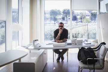 Businessman sitting in modern office