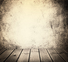 interior with an old wall and wooden floor