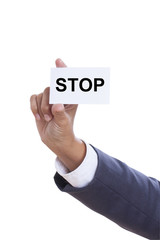 Businessman showing stop sign on white background 