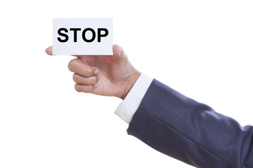 Businessman showing stop sign on white background