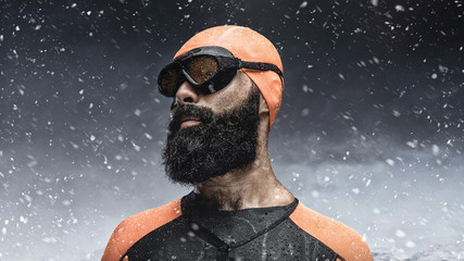 Fototapeta premium Bearded scuba diver under rain drops.