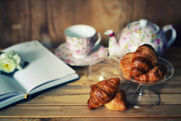 tea cup croissant book