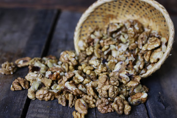 peeled walnut on a wooden background