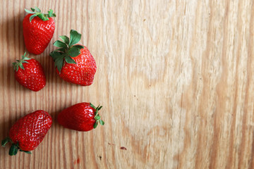 strawberries top on wooden background