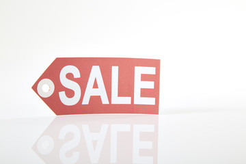 Red sale tag isolated on white background