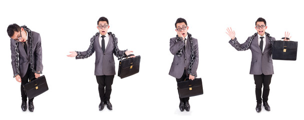 Businessman chained isolated on white