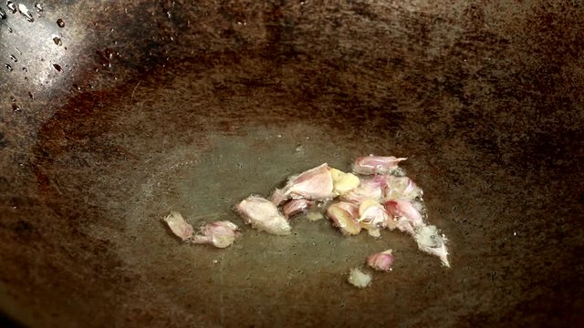 fry garlic in pan
