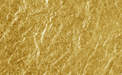 Shiny yellow leaf gold foil texture