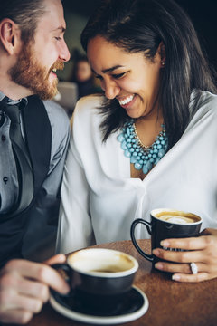 Couple drinking coffee in cafe