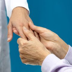 Women hand helping senior patient