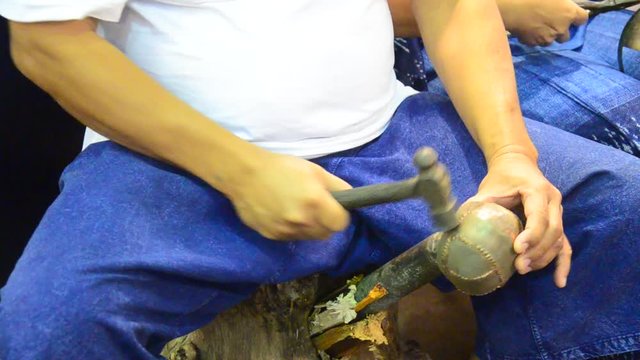 Thai people working made bronze metal appliances for show traveller in Ayutthaya, Thailand