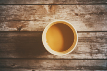 Coffee on a vintage background floor