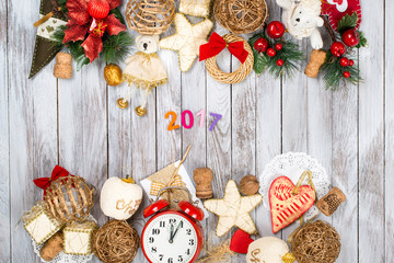 Christmas decoration over wooden background. Winter holidays concept. 2017 colorful numbers.