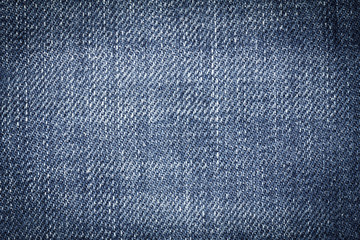 Naklejka premium Denim jeans texture or denim jeans background of fashion jeans design with copy space for text or image. Dark edged.