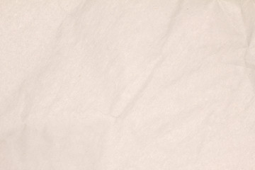 Recycled crumpled light brown paper texture or paper background for design with copy space for text or image.