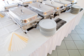 metal kitchen equipments on the table