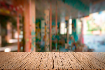 Wooden board empty table blur in a hall