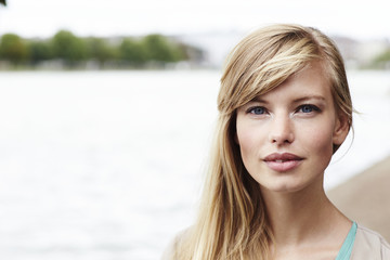 Blue eyed blond woman in close up, portrait