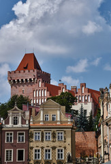 Townhouses in the Old Market Square and the tower of the Royal Castle in Poznan.