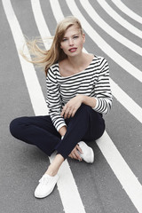 Portrait of beautiful woman wearing stripes