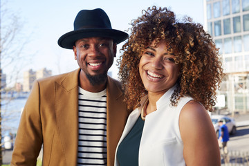 Couple smiling at waterfront
