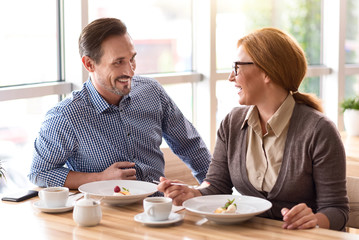 Positive colleagues having a lunch