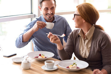 Joyful colleagues having a lunch