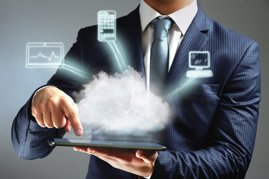 Businessman working with a Cloud Computing diagram