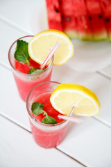 watermelon juice on wooden background. Selective focus