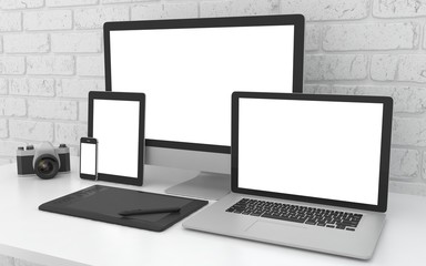 Fototapeta premium Responsive mockup screen. Monitor, laptop, tablet, phone on table in office. 3d rendering.