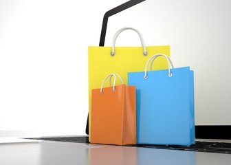 laptop and  shopping pags on white background. 3d rendering.