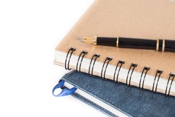 Diary with  pen  on white background