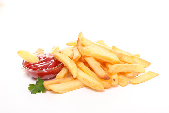 french fries and ketchup isolated on white