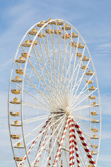Ferris wheel against a blue sky